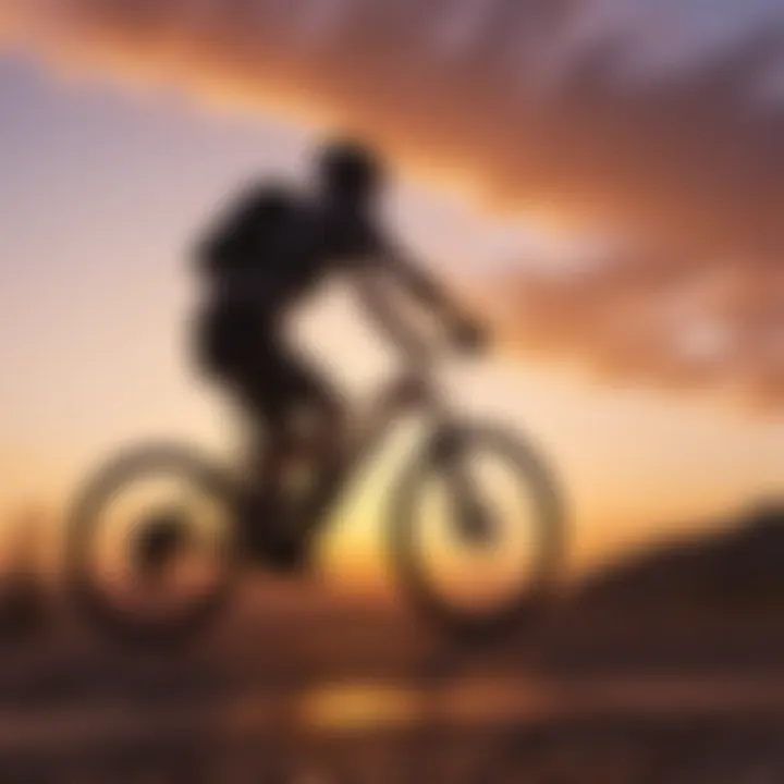 A vibrant sunset sky as a backdrop to a silhouette of a cyclist