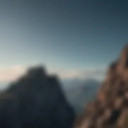 Silhouette of a person standing confidently on top of a mountain