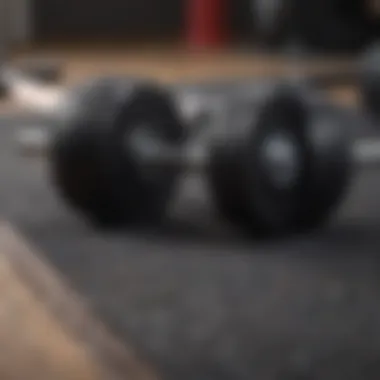Strength Training with Dumbbells Close-up of dumbbells positioned on a fitness mat, highlighting strength training