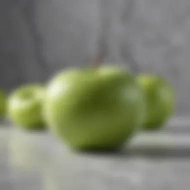 Green apple slices on marble background