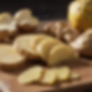 Ginger slices on a wooden cutting board