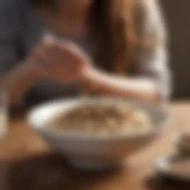 A woman enjoying a bowl of oatmeal topped with seeds and honey