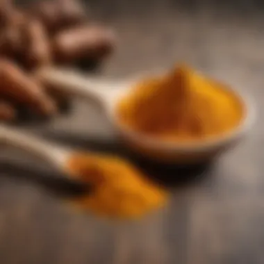 Turmeric Root Powder in Wooden Spoon